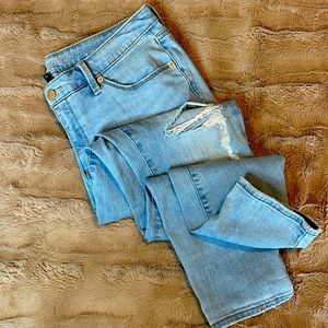 Lightly distressed high rise skinny jeans